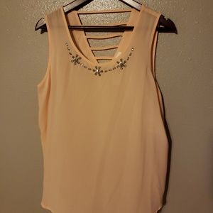 Sheer top with rhinestone detail